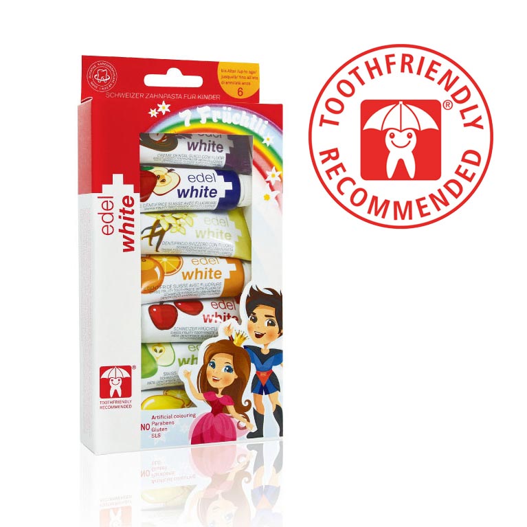 Pack of edel+white 7 Fruechli kids toothpastes with Toothfriendly International logo